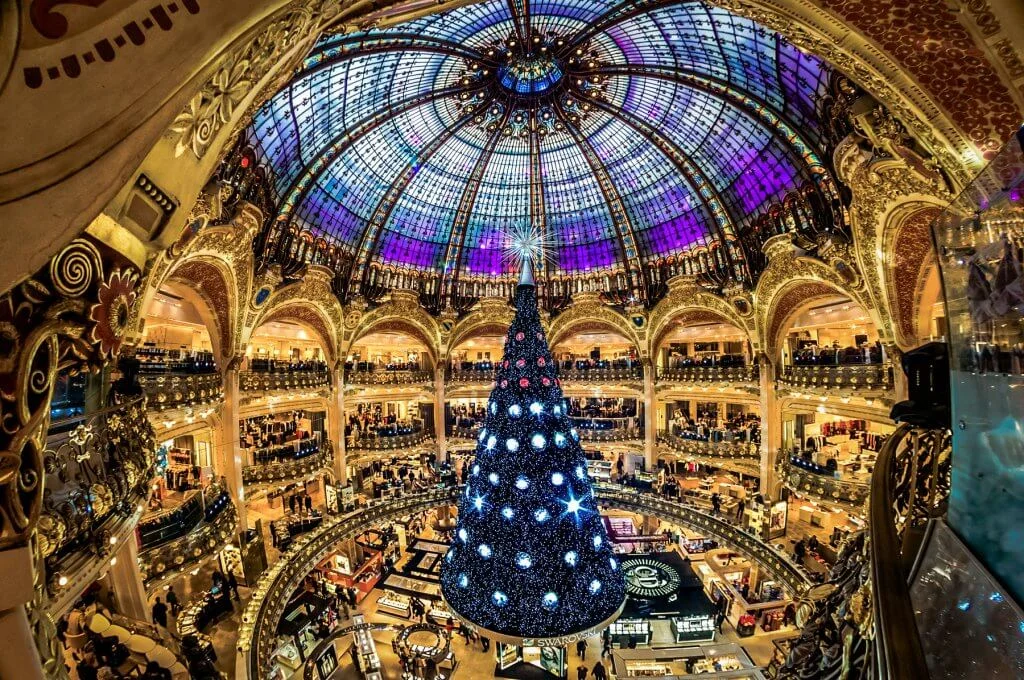 PARIS - DECEMBER 07: The Christmas tree at Galeries Lafayette on December 07, 2012, Paris, France. The Galeries Lafayette has been selling luxury goods since 1895.