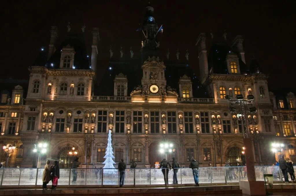 Skating in Paris in winter in front of the Hotel de Ville