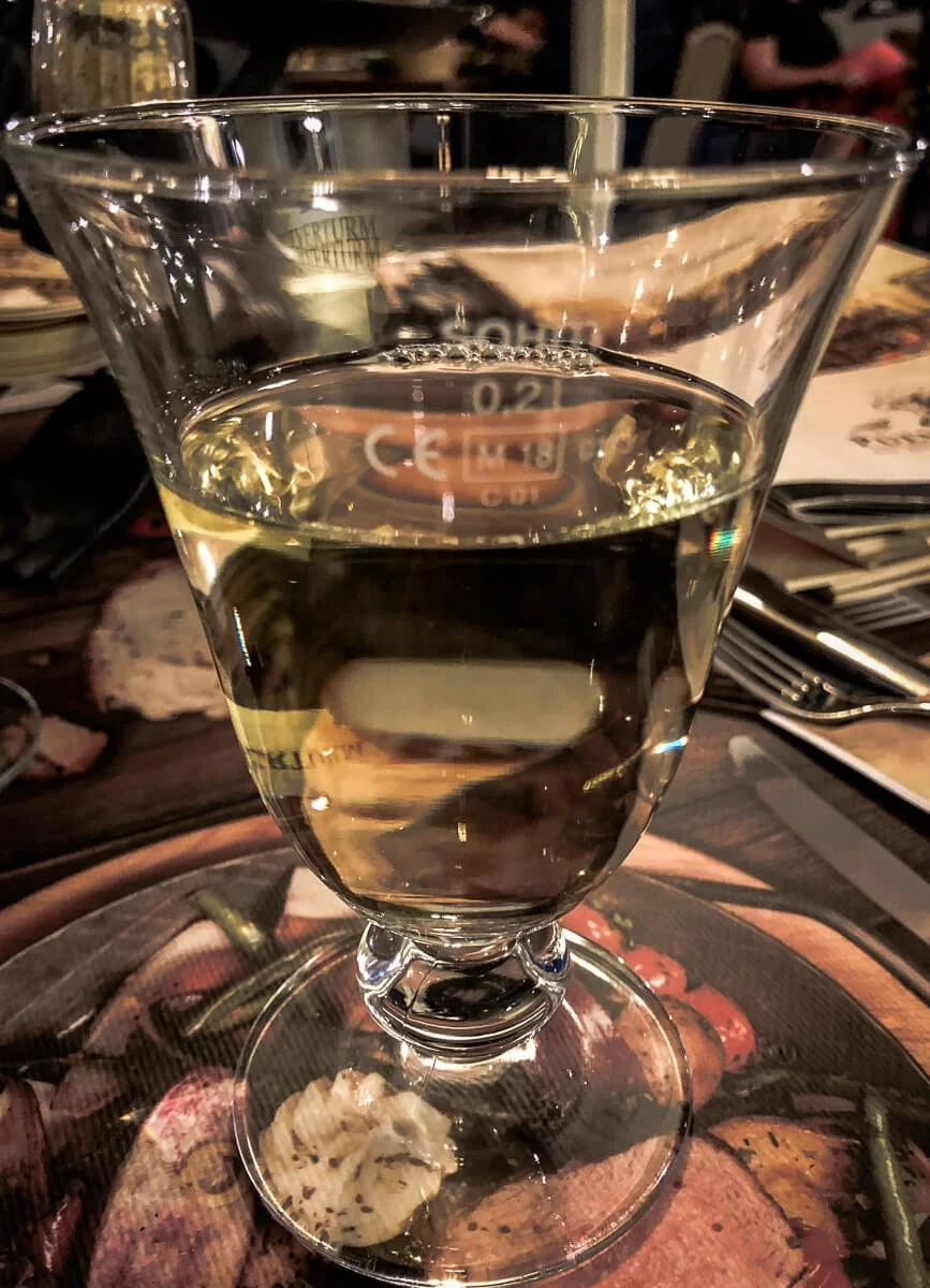 A glass of Muller-Thurgau wine