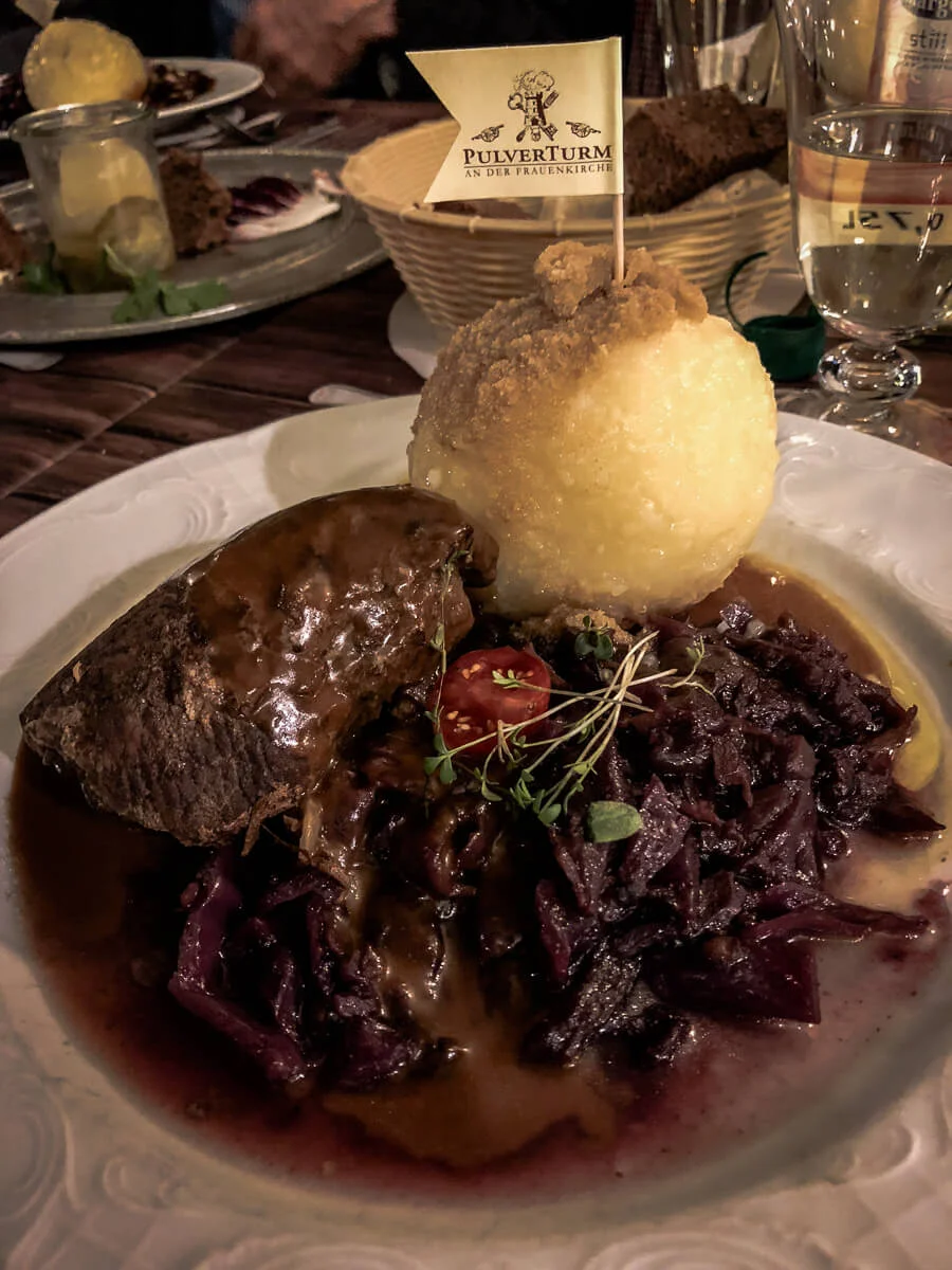 Where to Eat in Dresden: Rinderroulade served a white plate