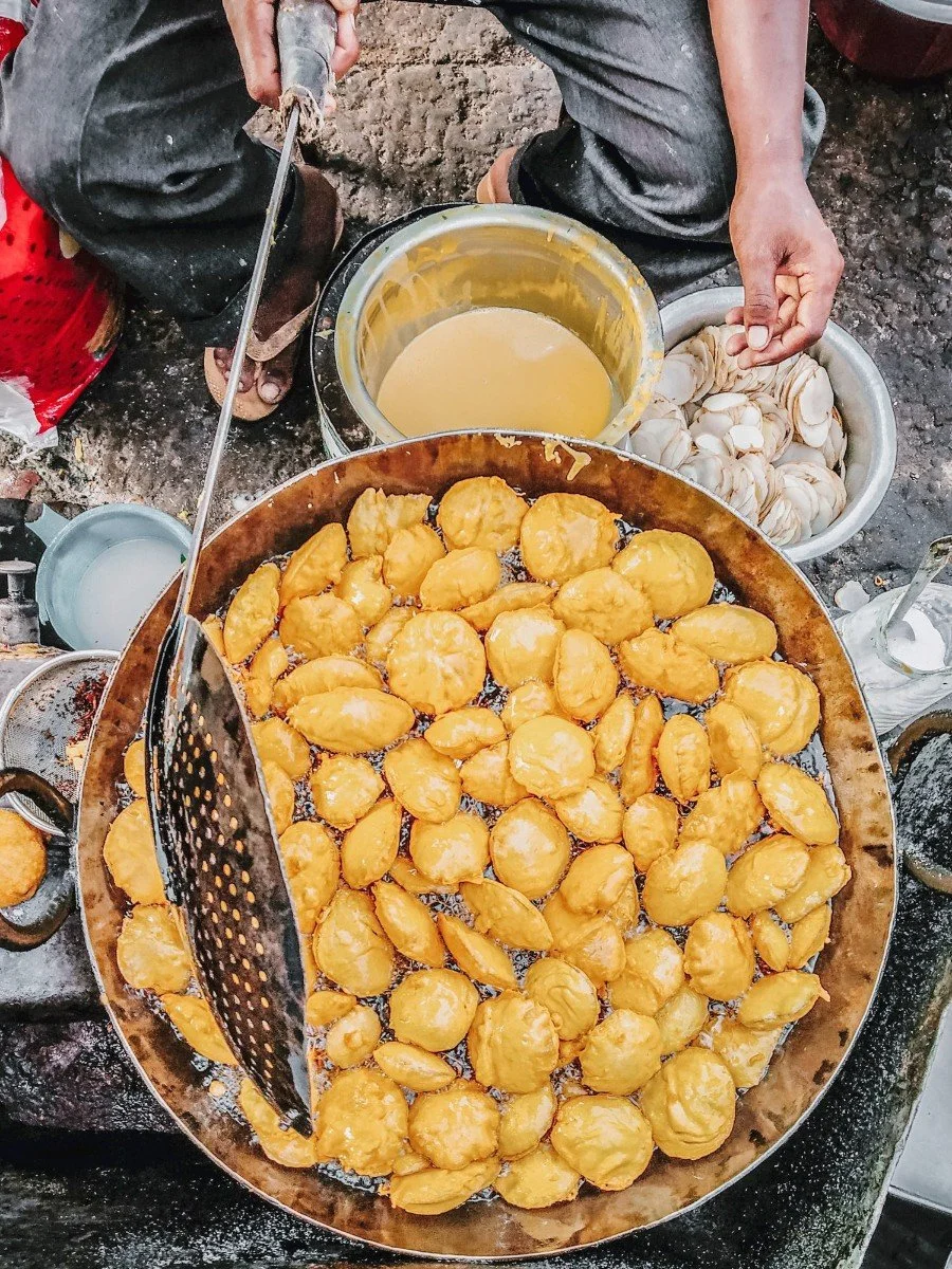 street food frying in a pan in India